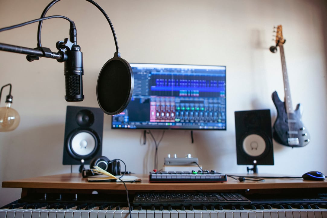 Mixer, Microphone and Instruments in Recording Studio